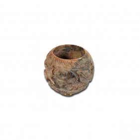 Stein Kopf mit Intarsien